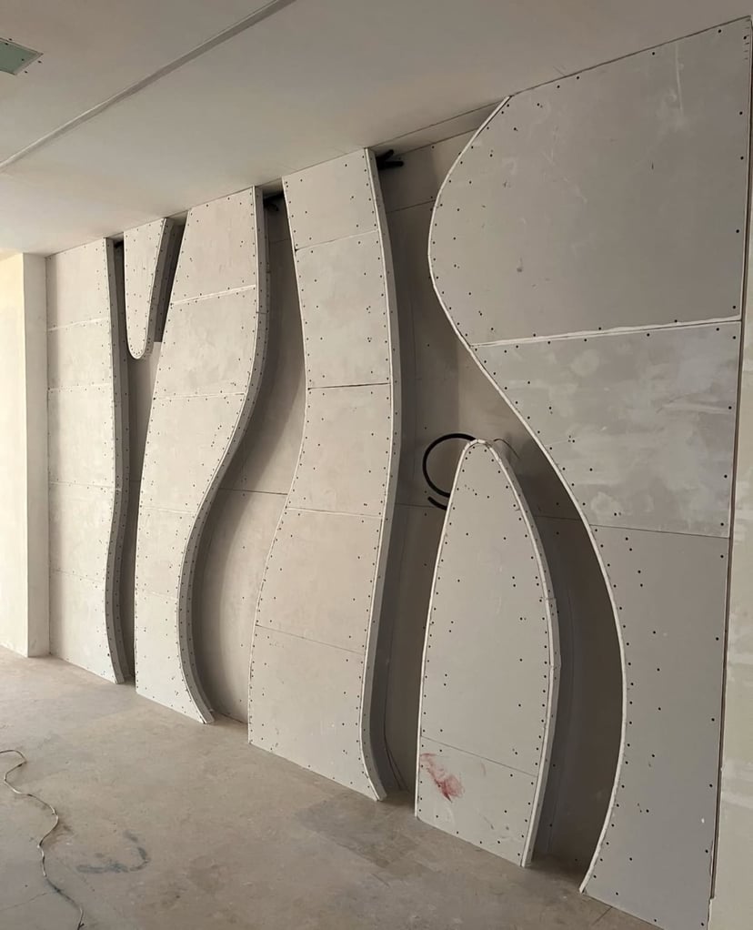 Moisture-Resistant Gypsum Board Installation for Wet Areas Specialized moisture-resistant gypsum board installation in bathroom with proper vapor barriers