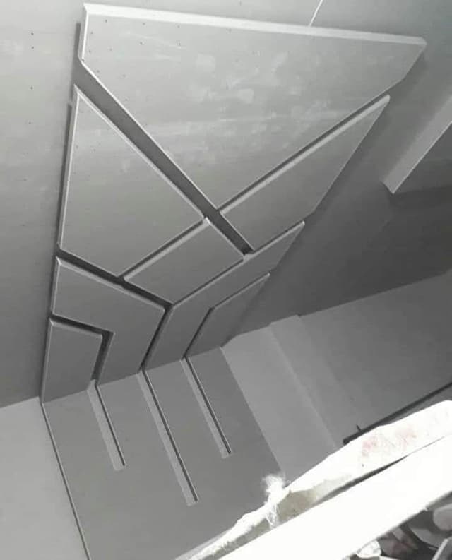 Gypsum Board Installation with Built-in Framework Gypsum board installation incorporating built-in framework and entertainment center integration