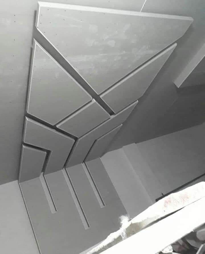 Gypsum Board Installation with Built-in Framework Gypsum board installation incorporating built-in framework and entertainment center integration