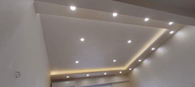 Basement Finished Gypsum Board Installation Finished basement gypsum board installation with proper moisture control and insulation