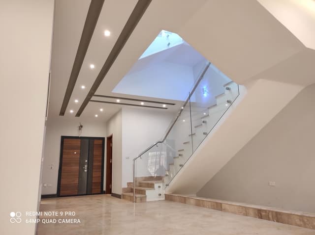 Utility Room Gypsum Board Installation Moisture-resistant gypsum board installation in utility room with proper vapor barriers