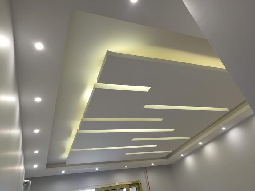 Large Window Gypsum Board Framing Gypsum board installation around large windows with precise measurements and clean finishing